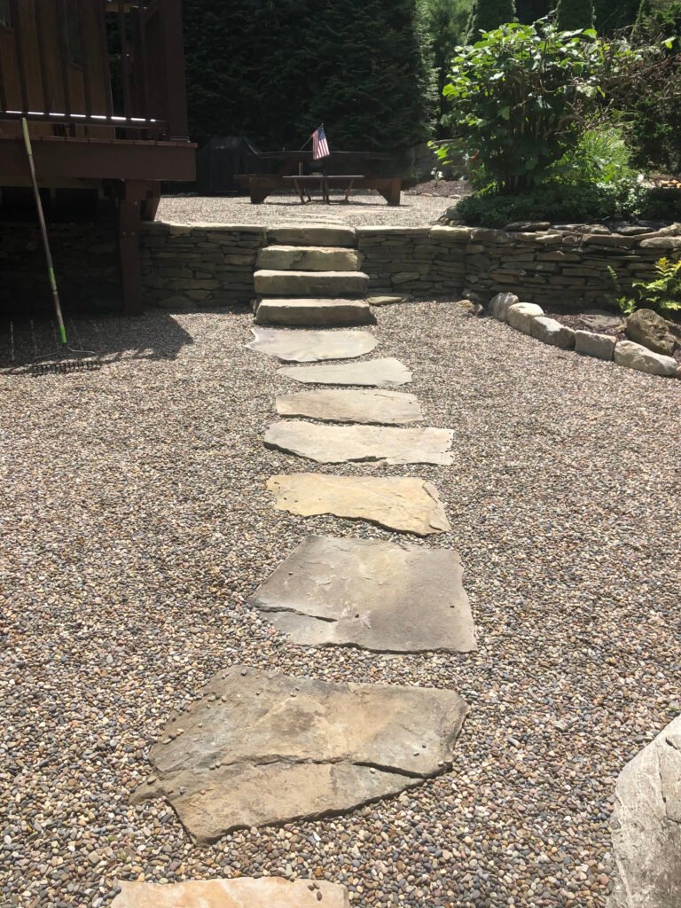 Expert patios and walkways installation in Westchester County, featuring custom-designed stone or pavers for durable and stylish outdoor living spaces.